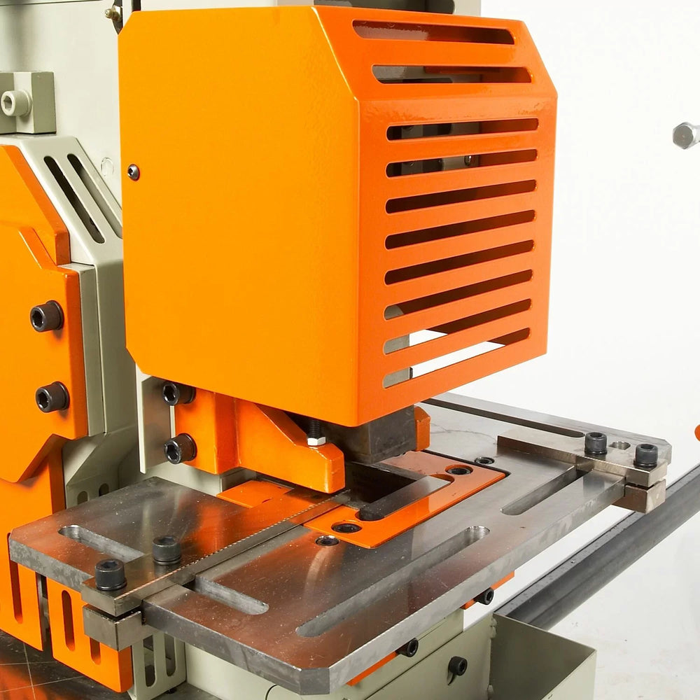 Orange and silver machine tool on a white background