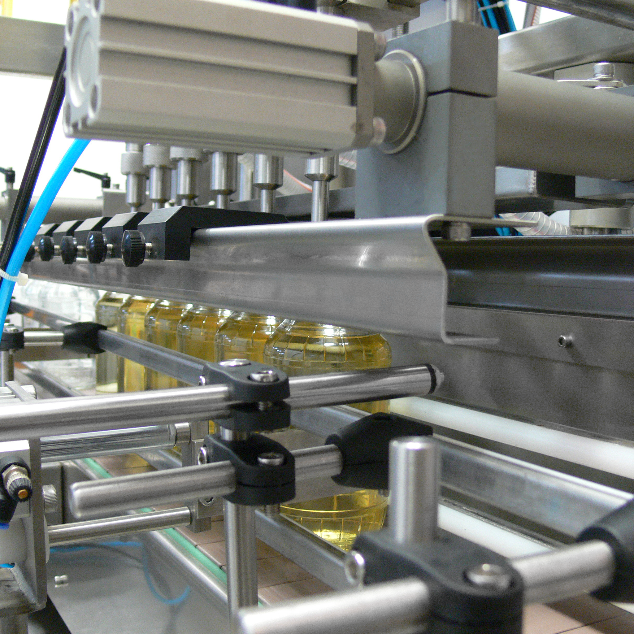 Jores Technologies 6 Head Inline Gravity Filling System with Conveyor - 1000 ml