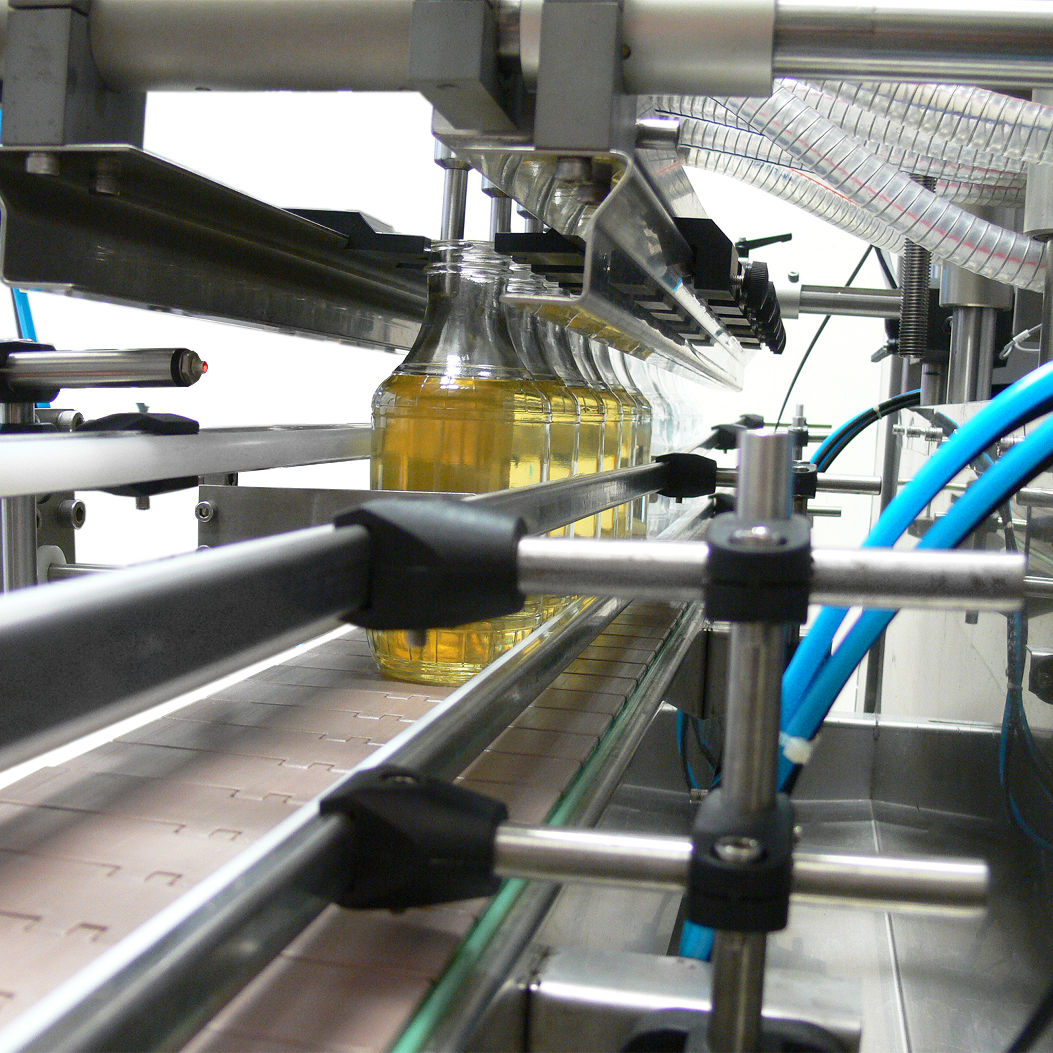 Jores Technologies 6 Head Inline Gravity Filling System with Conveyor - 1000 ml