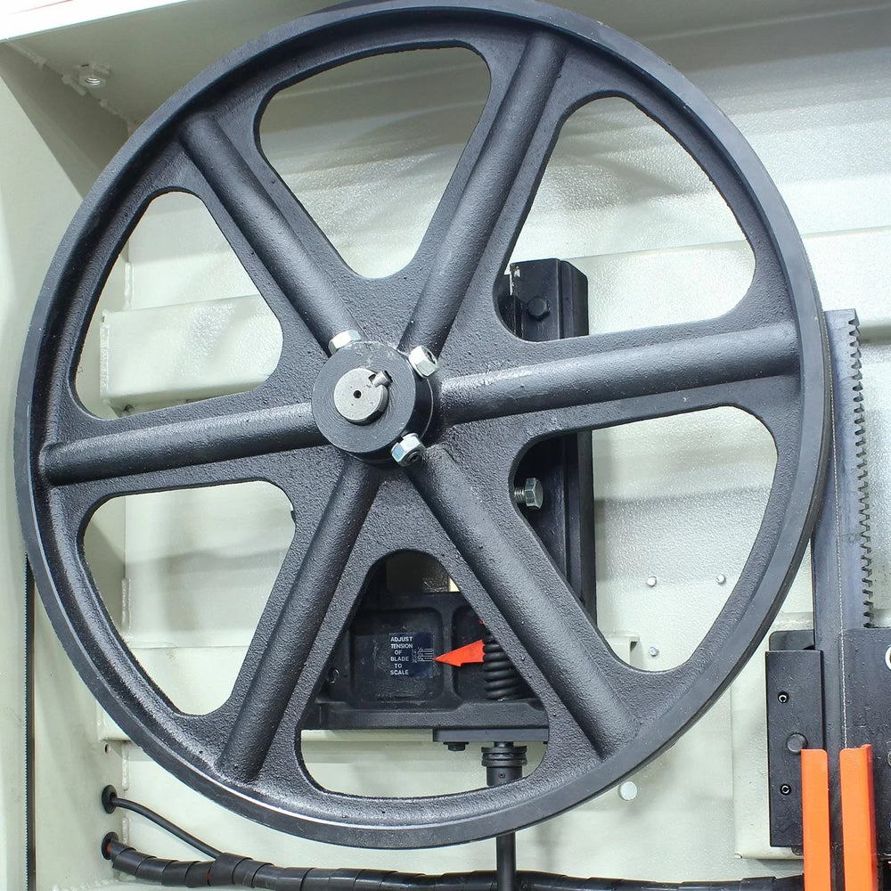 Large wheel with mechanical components on a white background