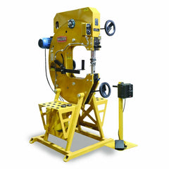 Yellow drill press with visible brand logo on a white background